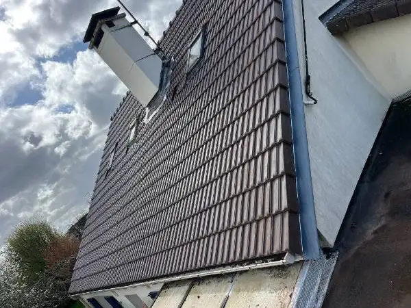 Toiture réalisée par Moïse Fortin, couvreur à Gazeran